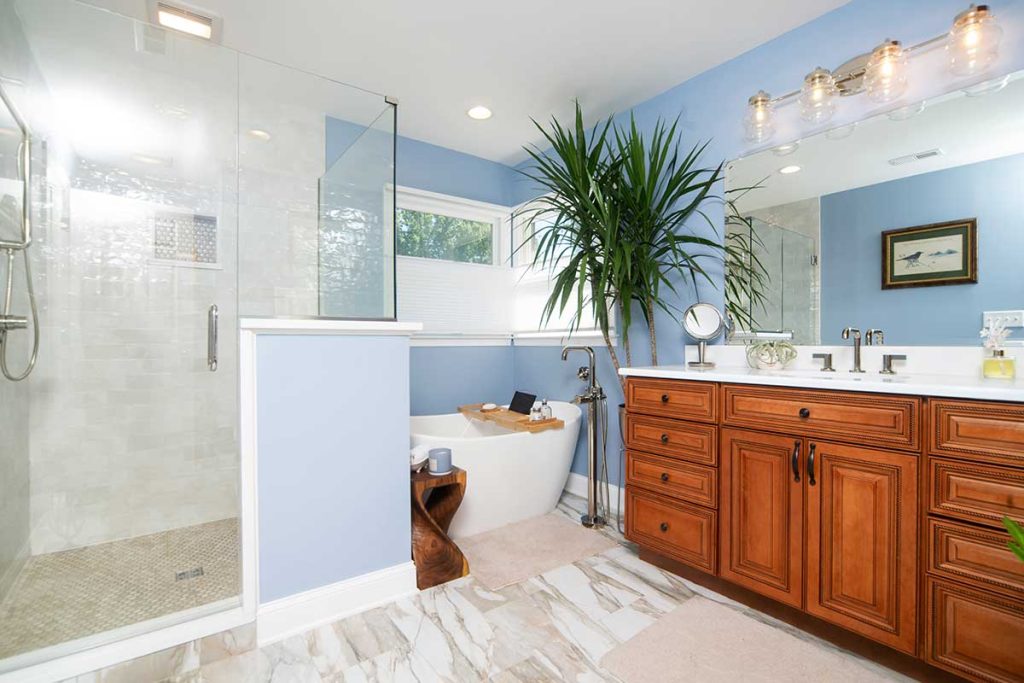 This bathroom renovation uses color psychology to create a peaceful and serene atmosphere.